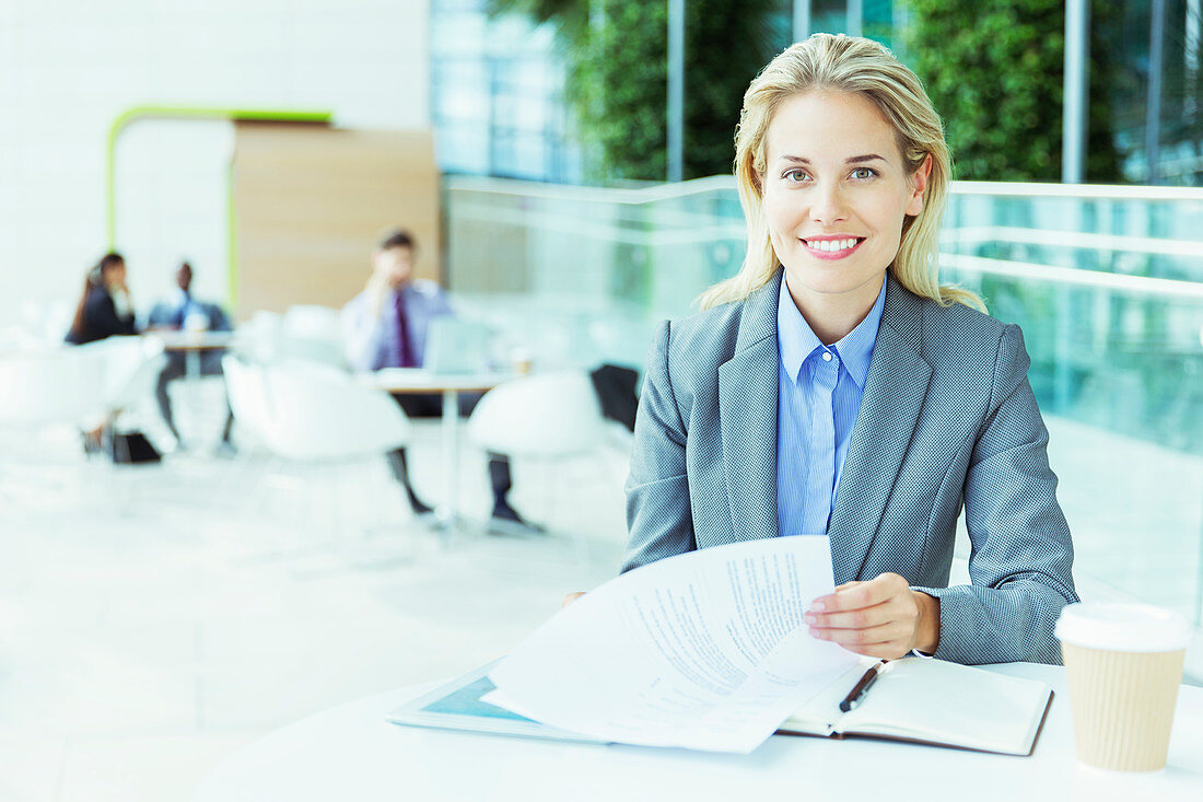 Businesswoman smiling in office