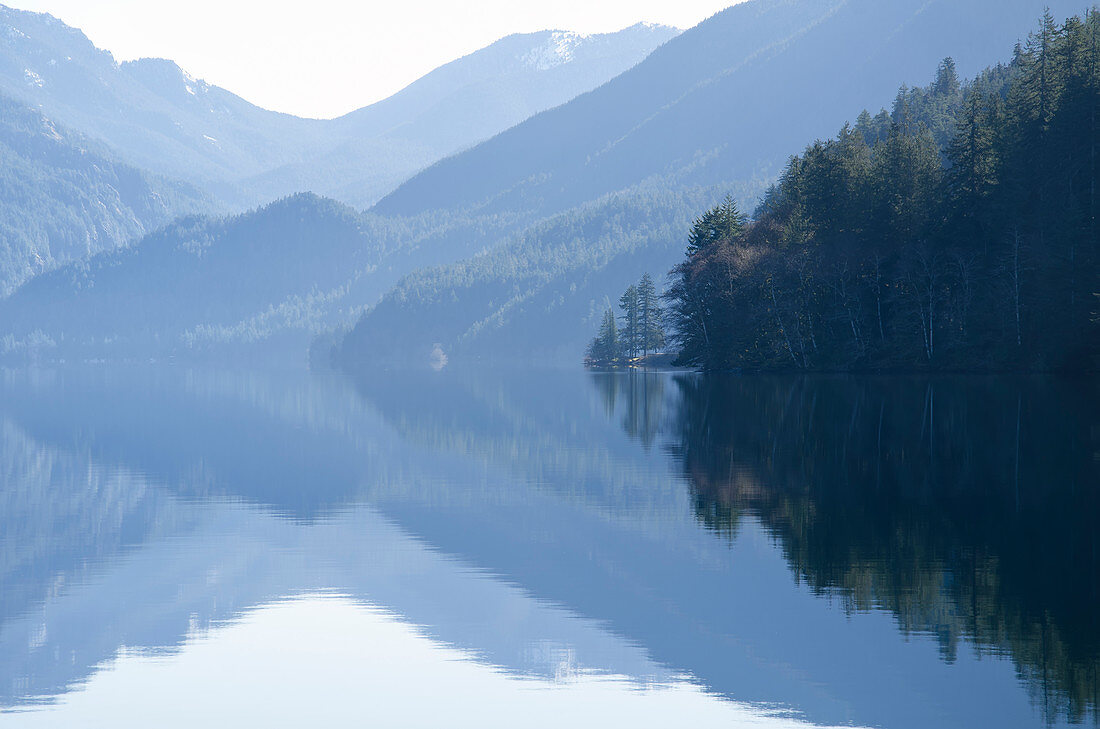 Mountains reflected in calm lake
