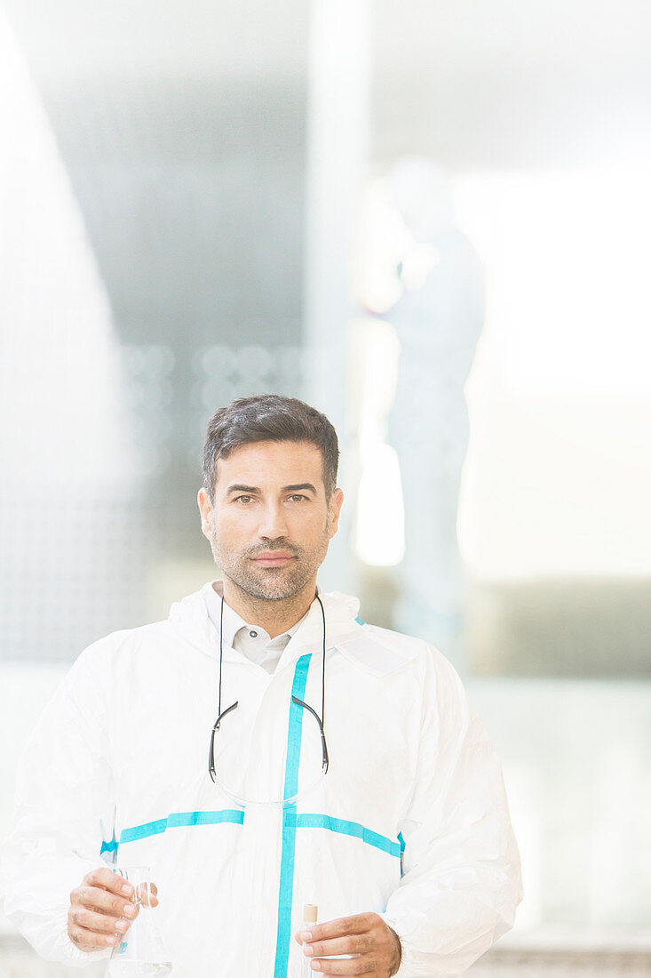 Confident scientist in clean suit