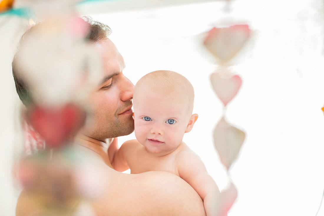 Father holding baby girl