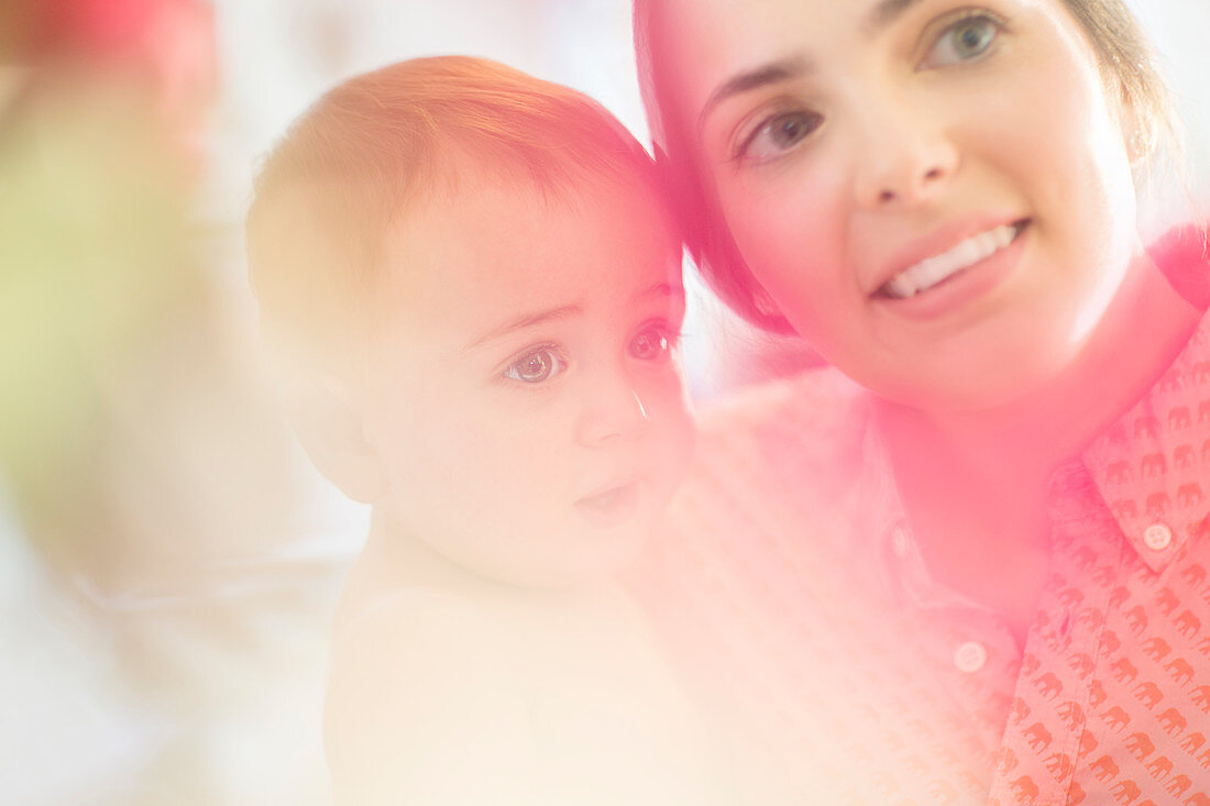 Mother holding baby boy