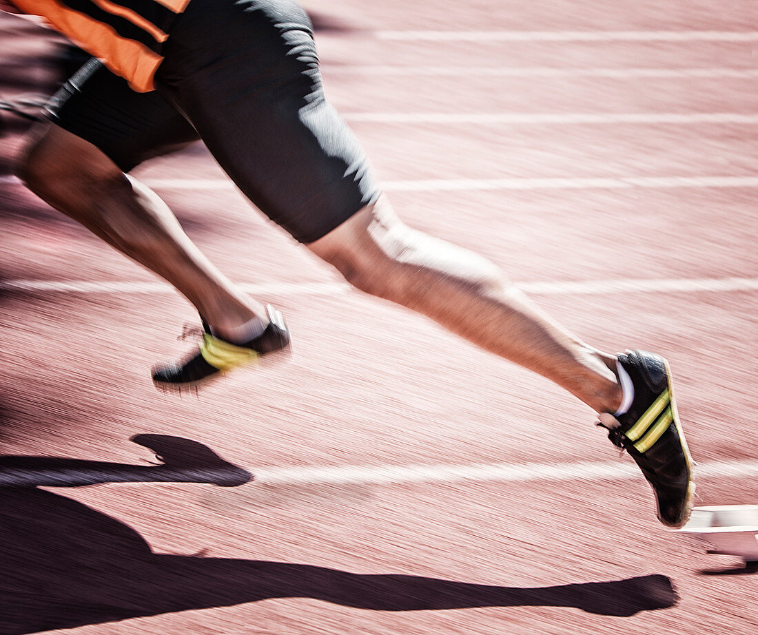 Sprinter taking off from starting block