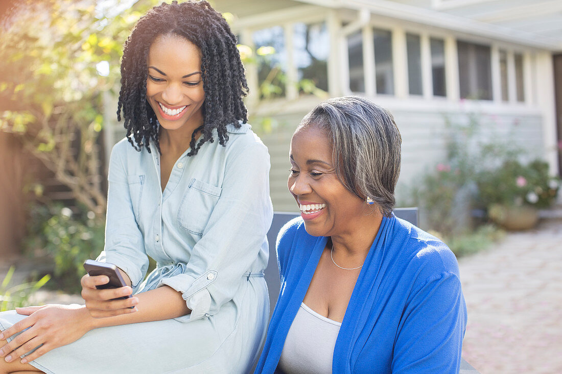 Mother and daughter text messaging