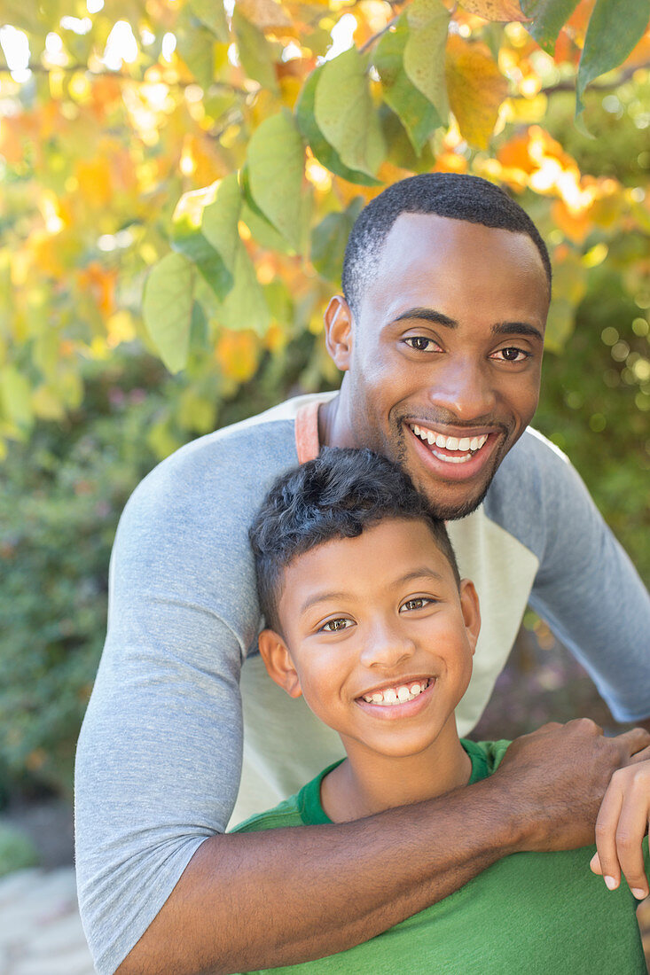 Close up Smiling father and son