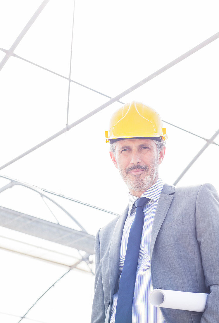 Confident architect wearing hard-hat