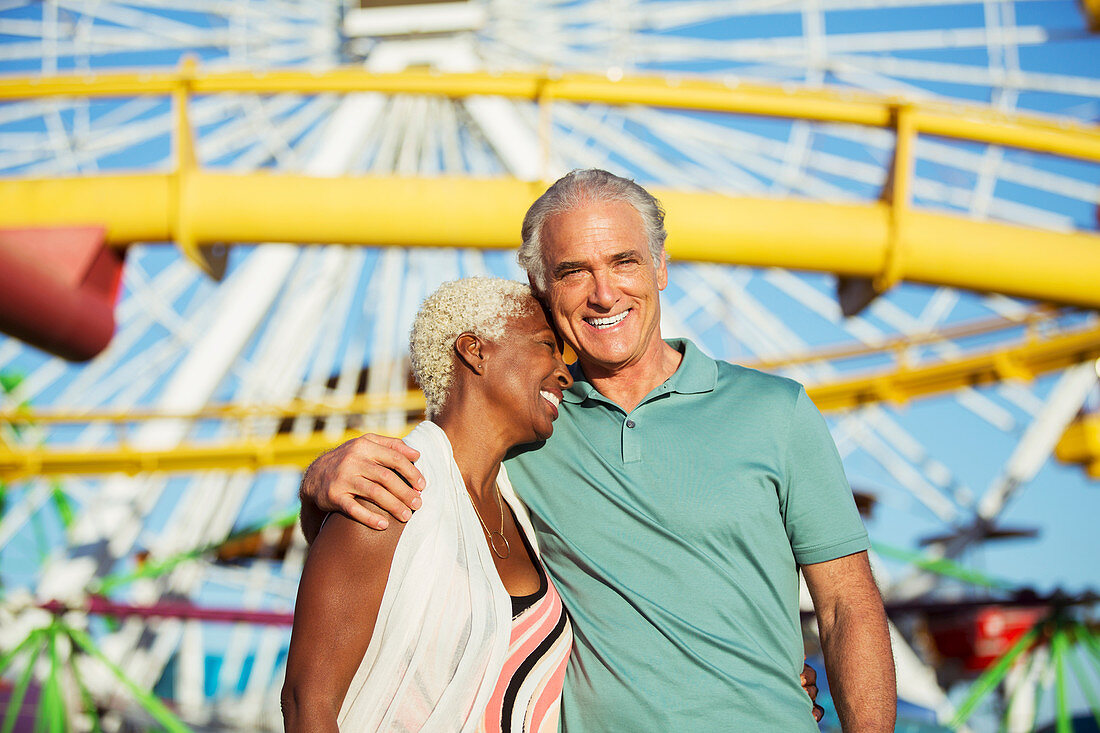 Portrait of hugging senior couple