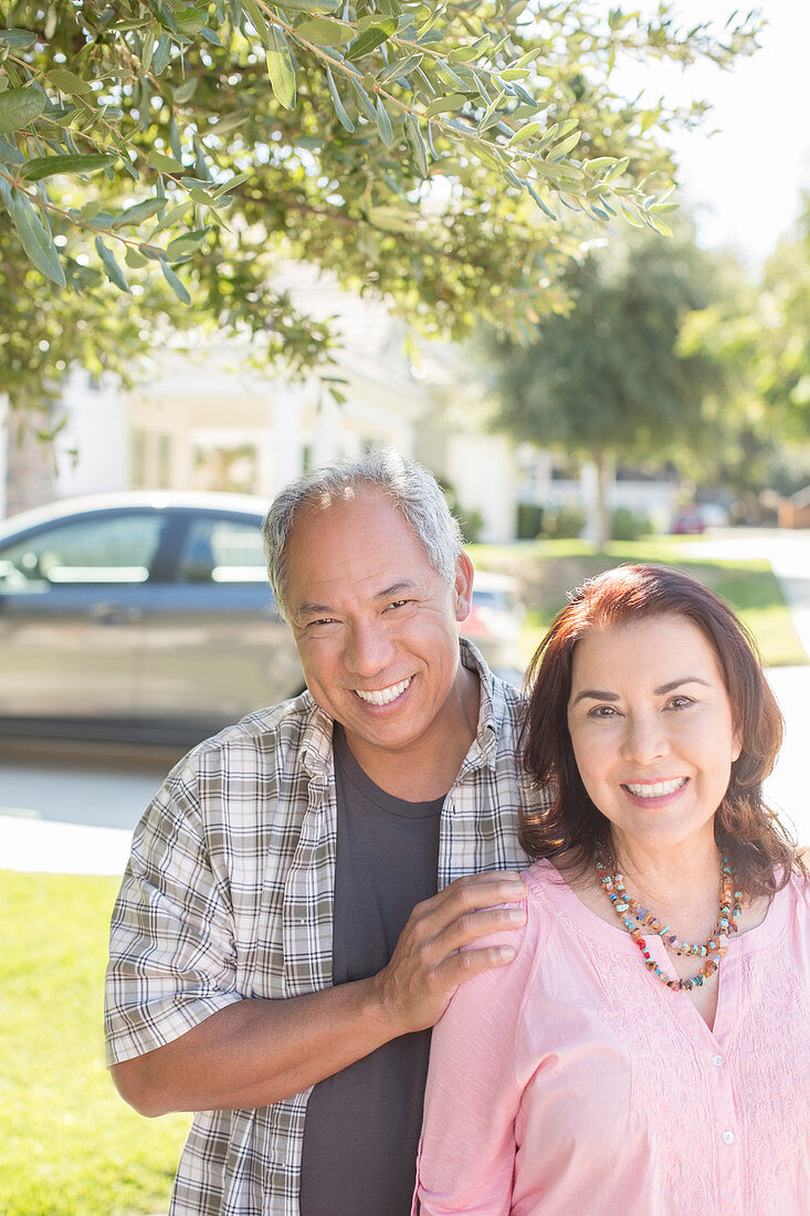 Portrait of smiling couple outdoors