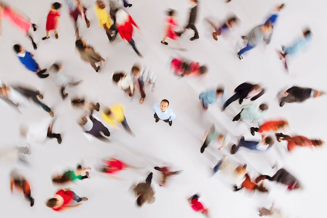 Businessman standing out from the crowd