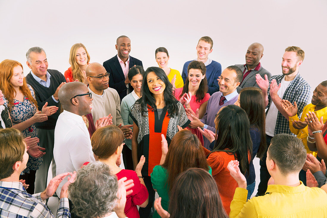 Business people clapping