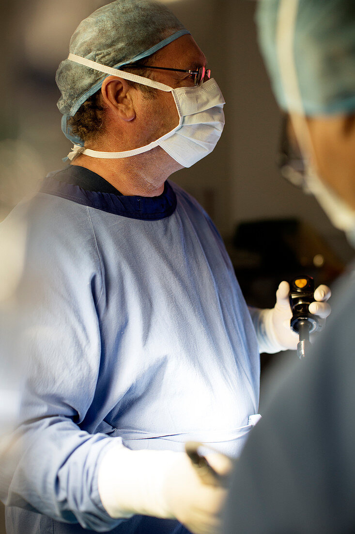 Doctor performing laparoscopic surgery