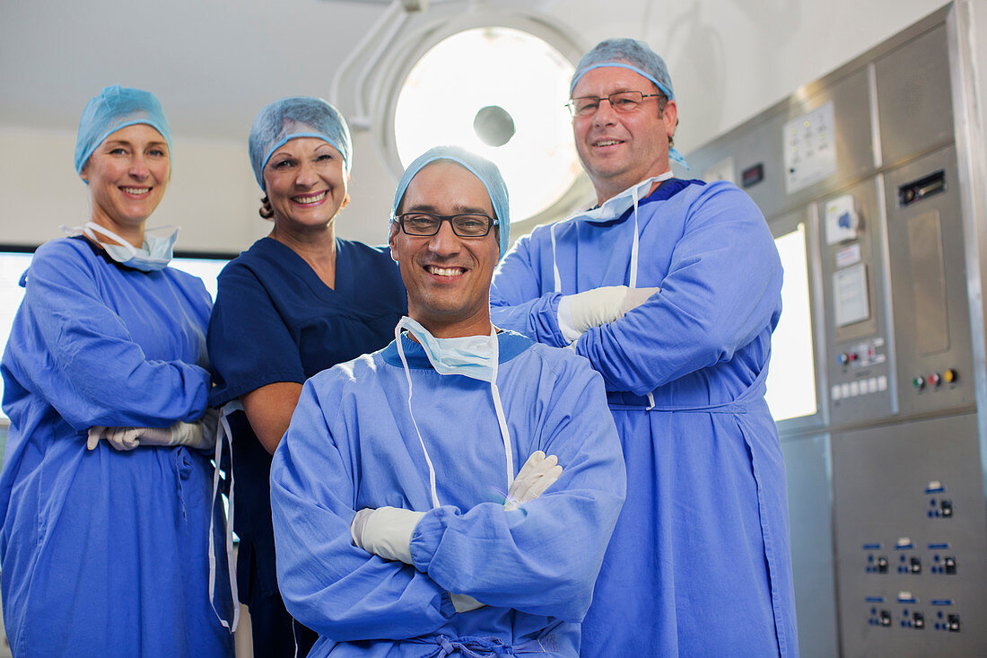 Team of doctors wearing surgical clothing