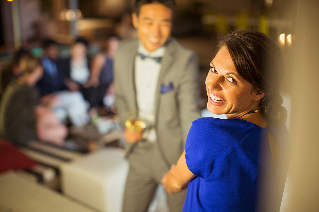 Woman laughing at party