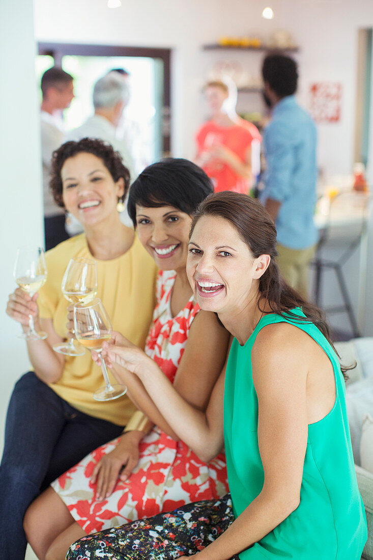 Women smiling together at party
