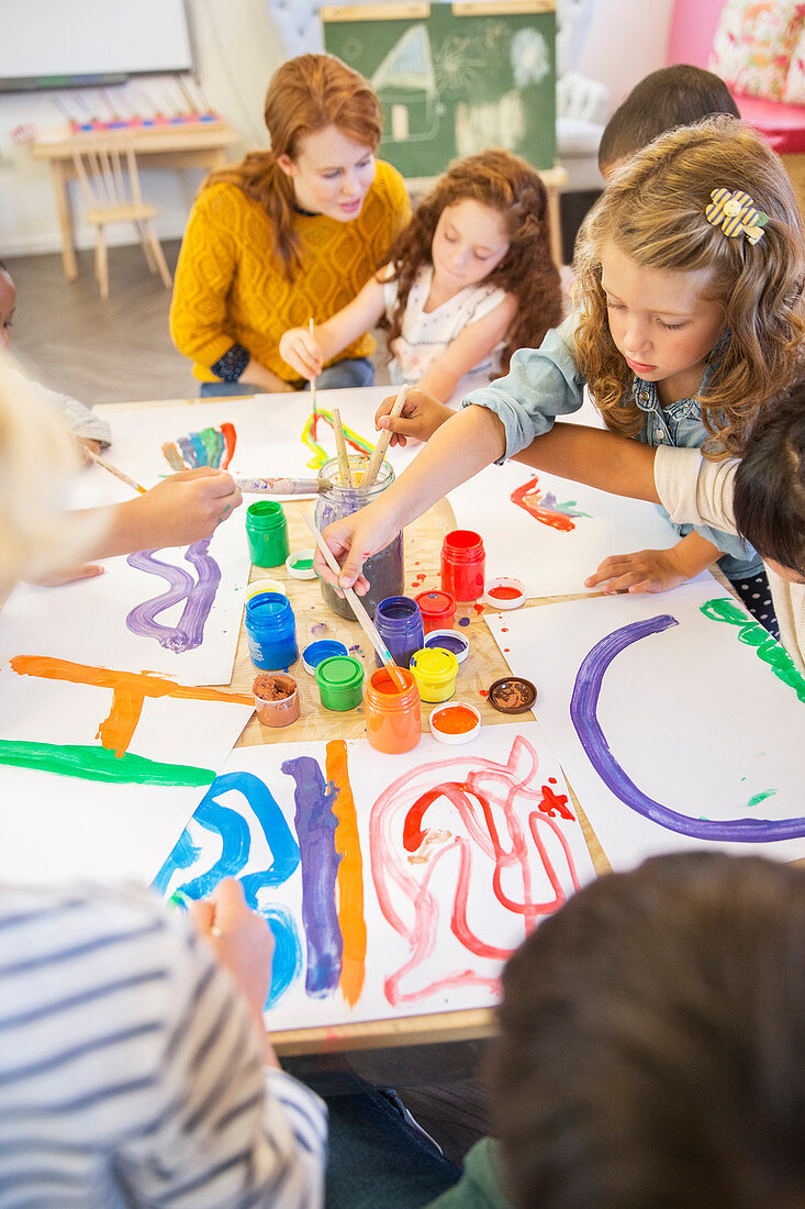 Students painting in class