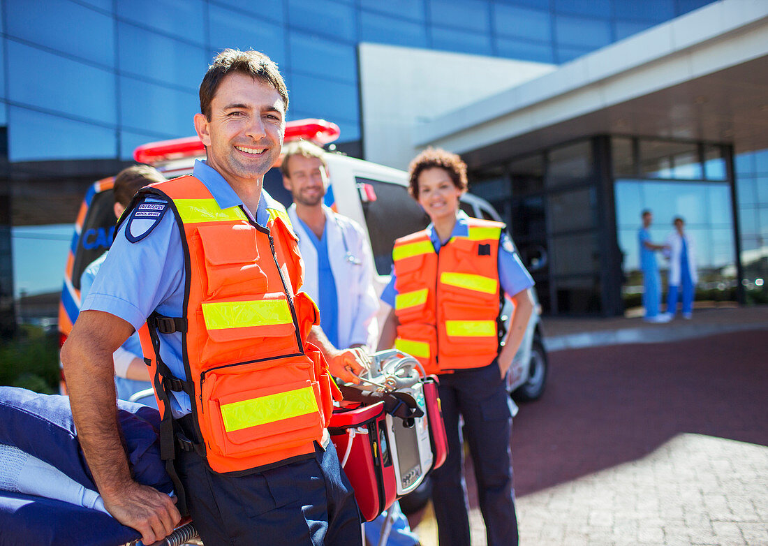 Paramedics smiling outside hospital