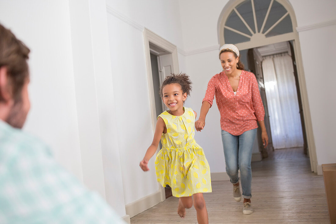 Mother and daughter running