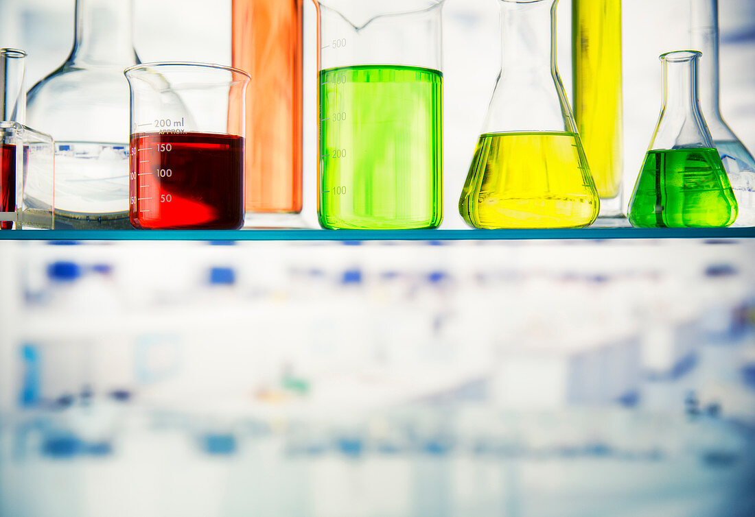 Close up of beakers on shelf