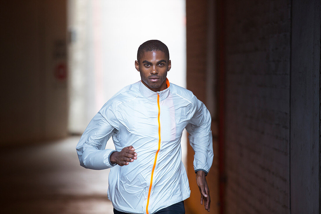 Man running through city streets