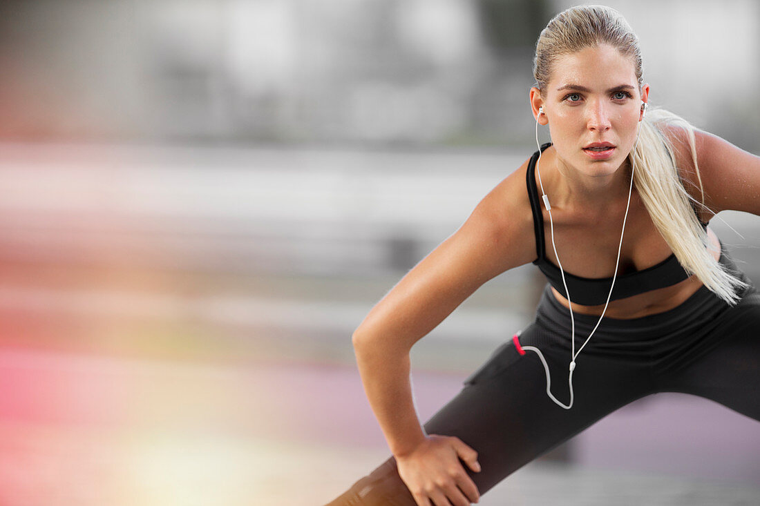 Woman stretching before exercising