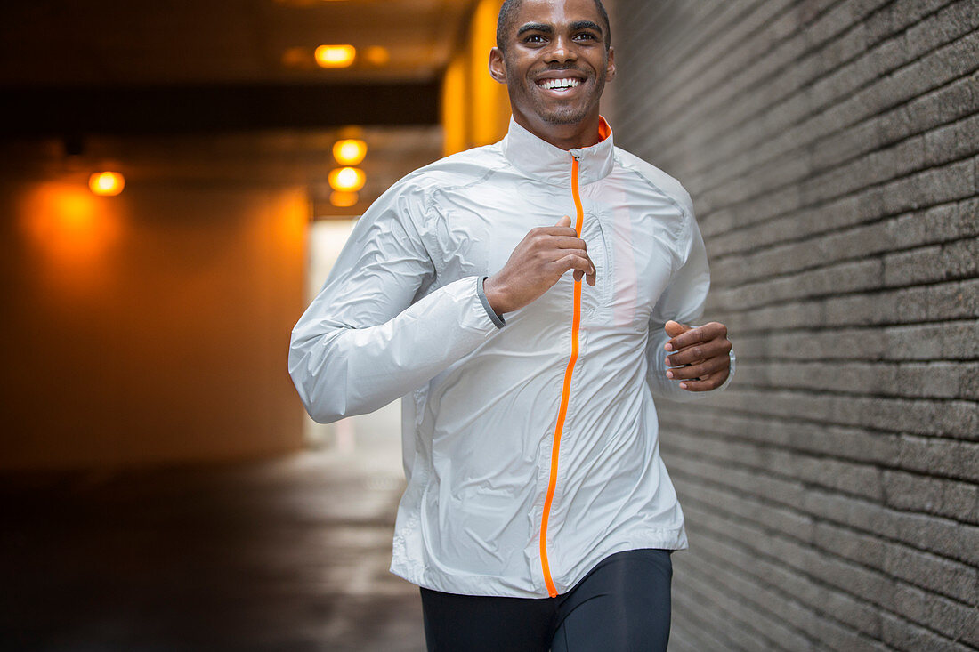 Man running through city streets