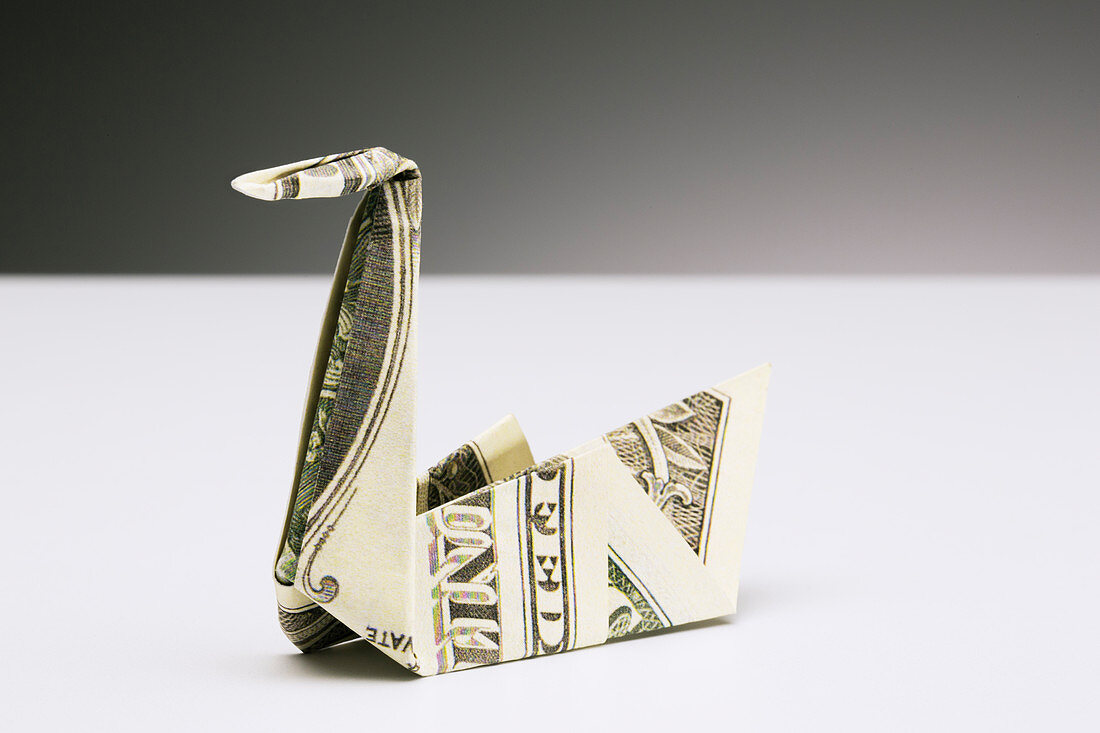 Origami swan made of dollar bill