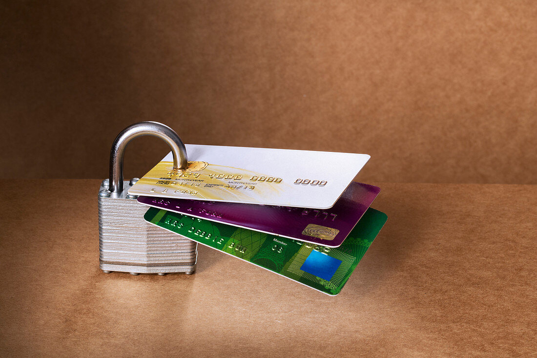 Credit cards attached to padlock