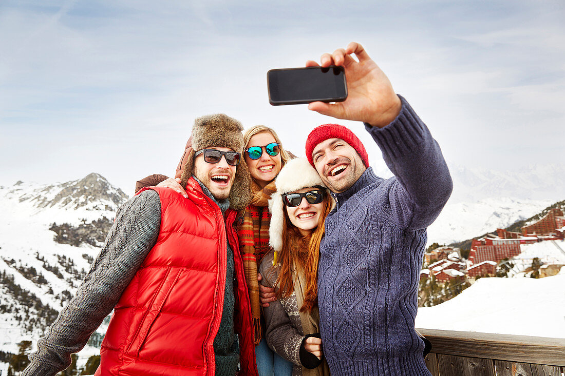 Friends taking picture in the snow