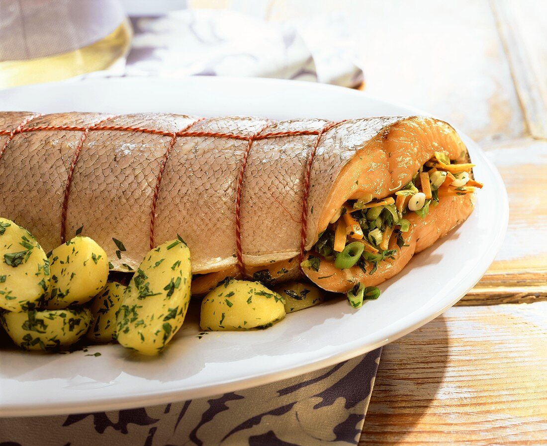 Salmon with vegetable stuffing and parsley potatoes