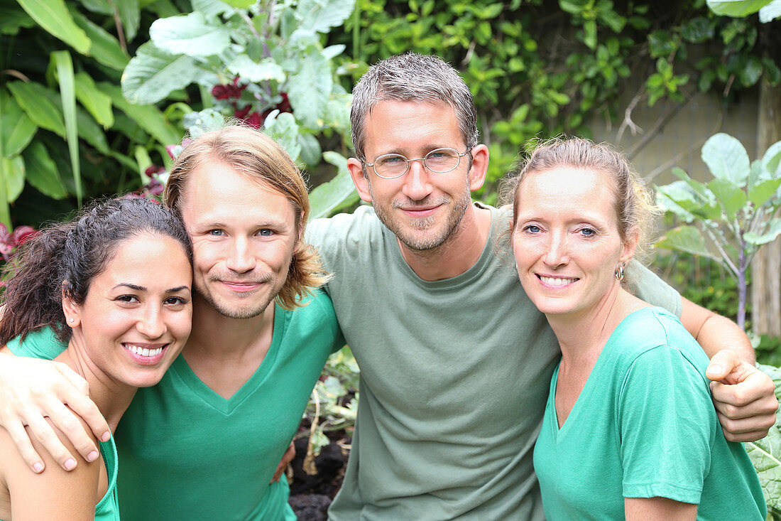 Portrait of four men and women