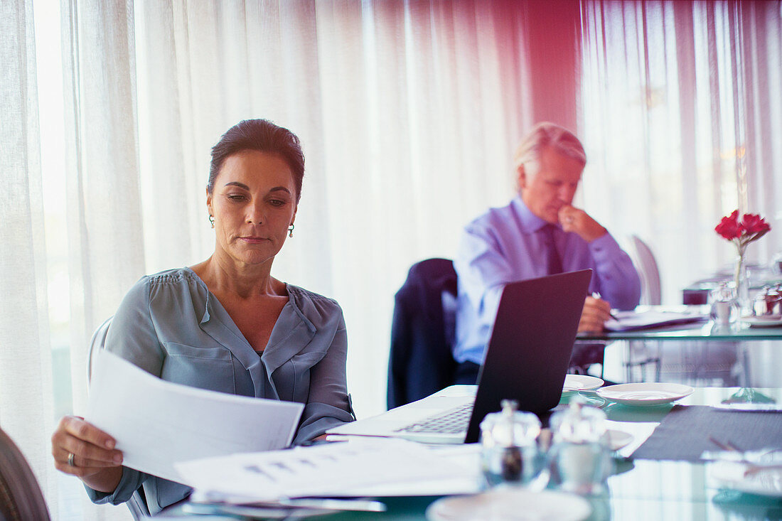 Business woman and business man working