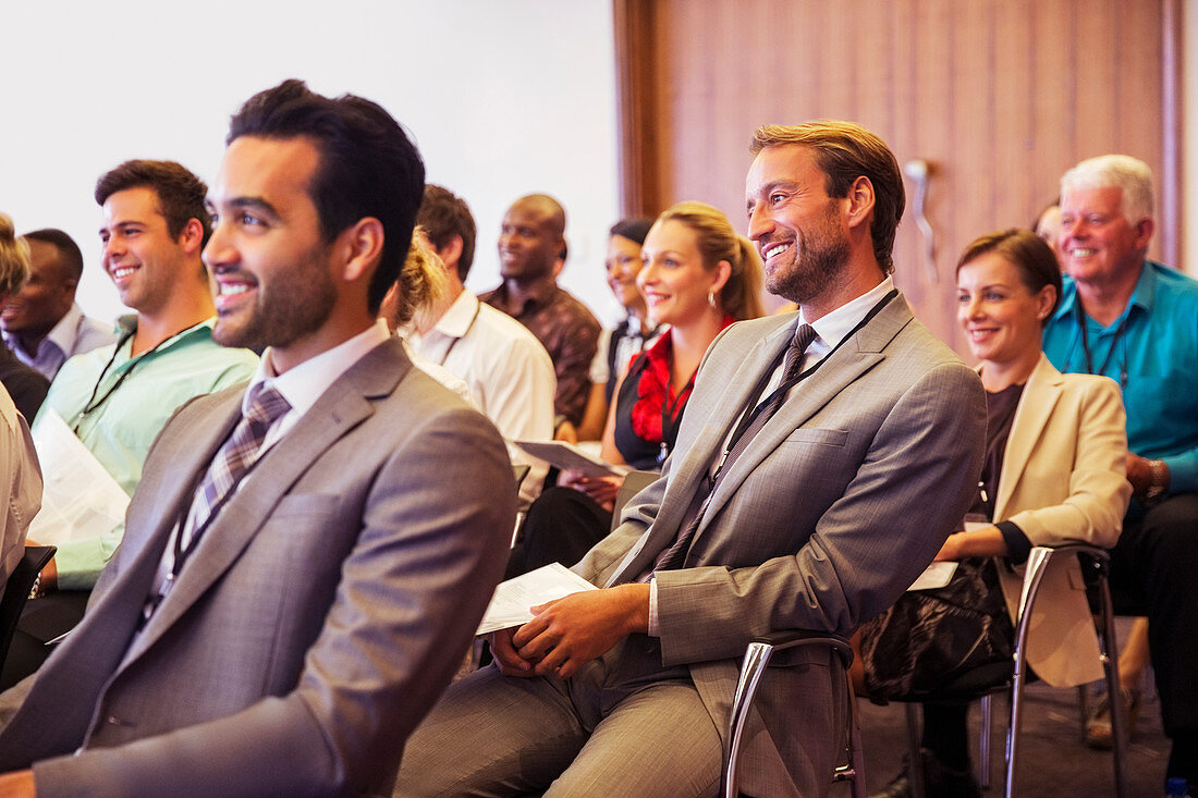 Business people attending meeting