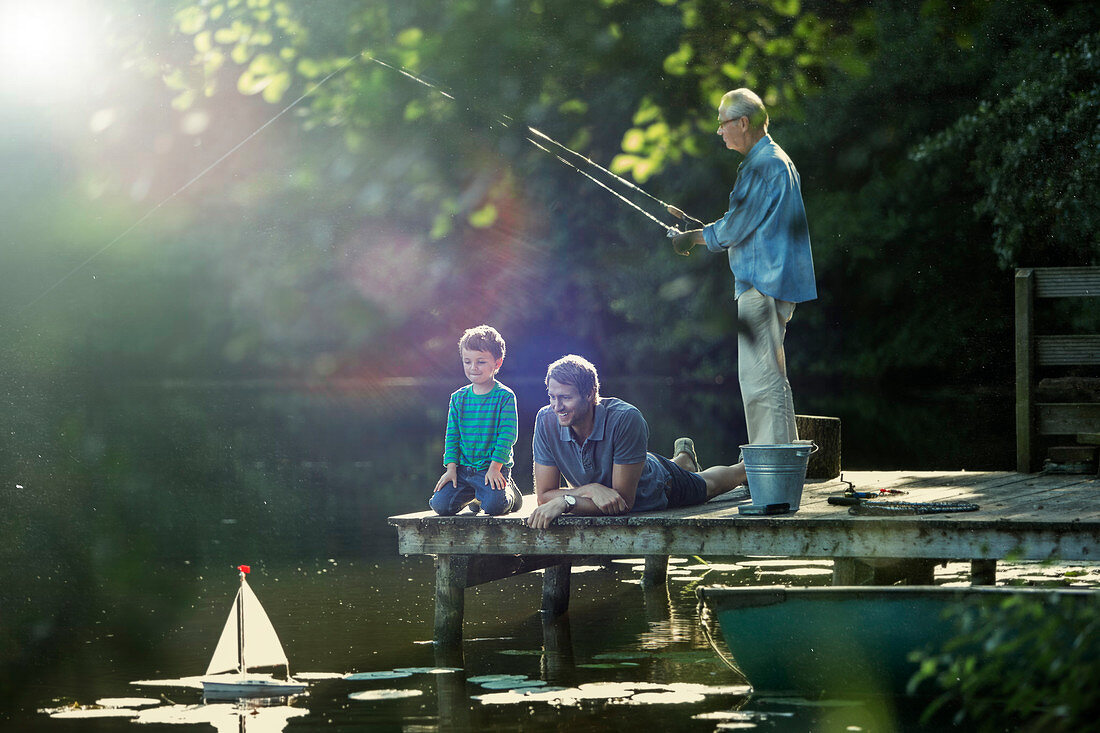 Boy fishing and playing