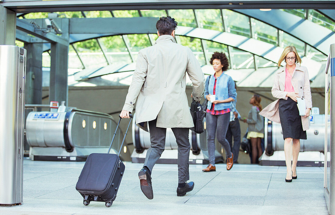 Businessman pulling luggages