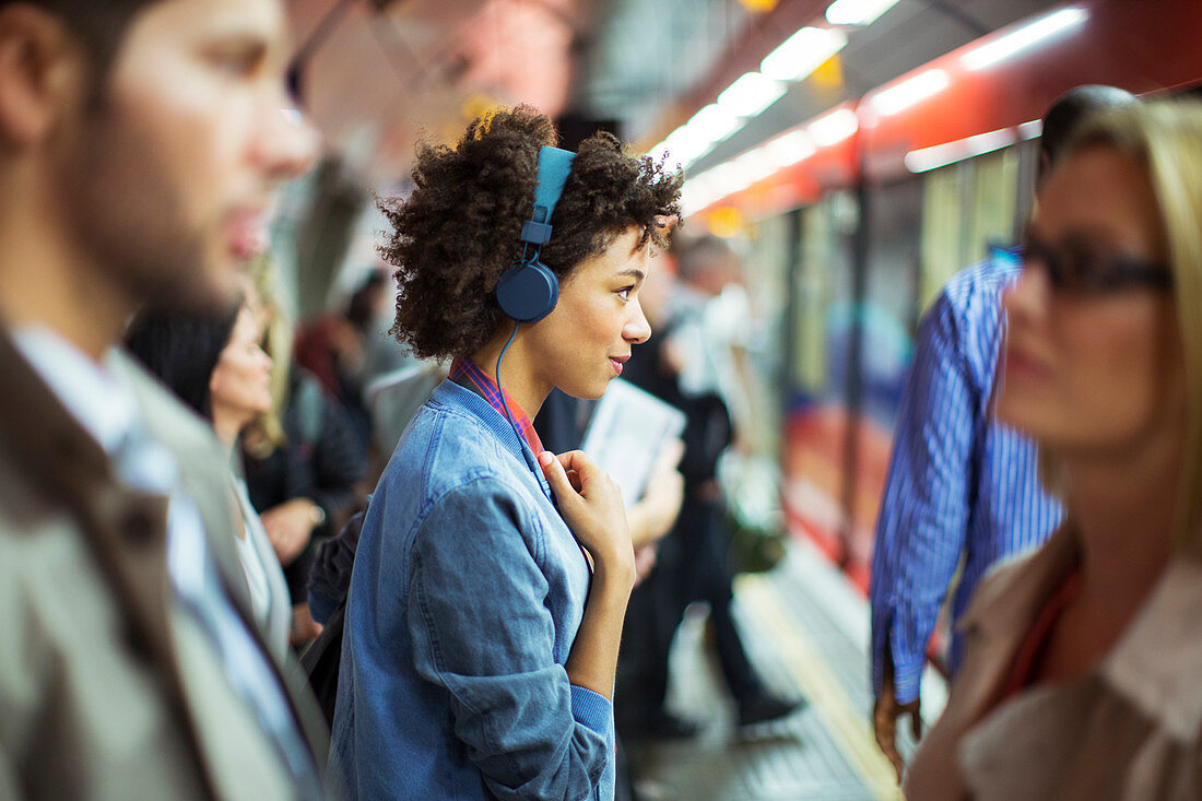 Woman listening to headphones