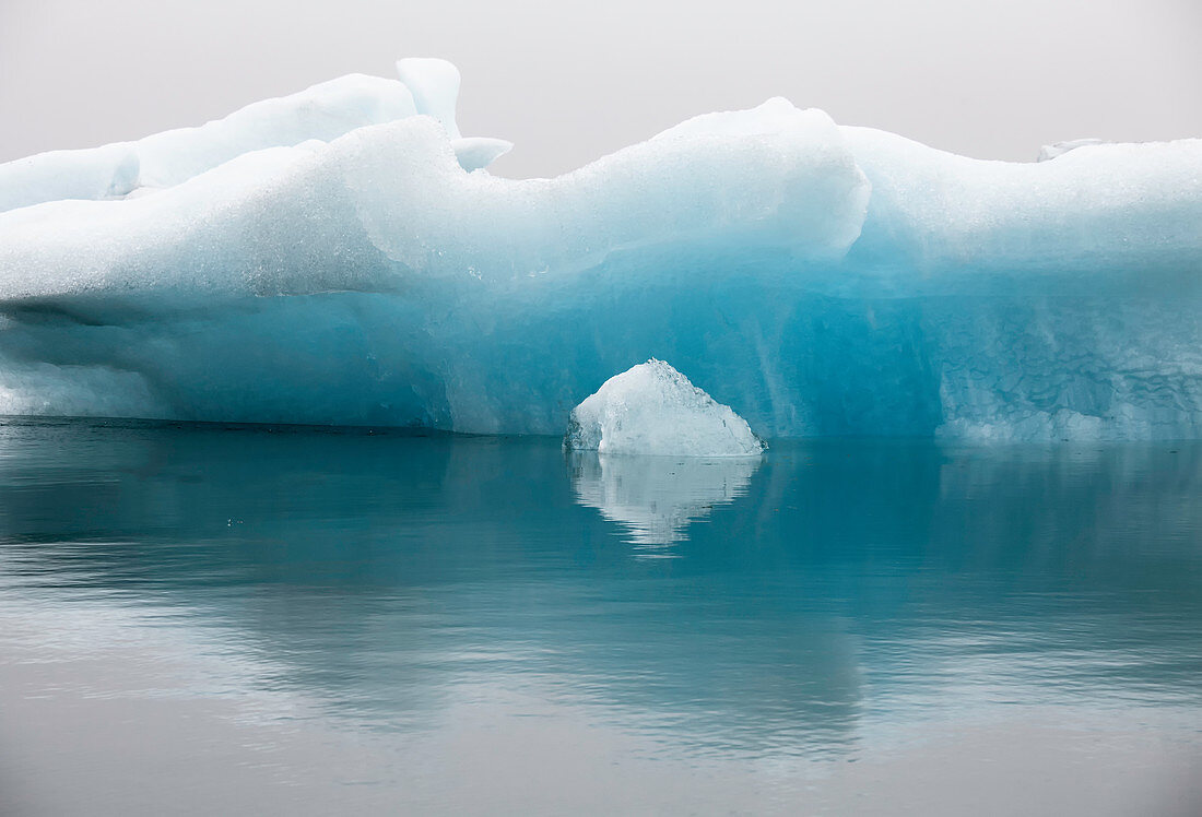 Blue iceberg formation in calm water