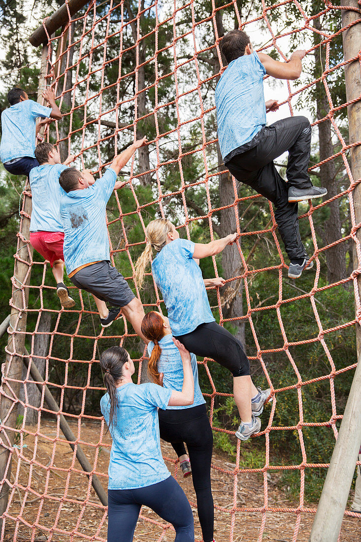 People climbing net