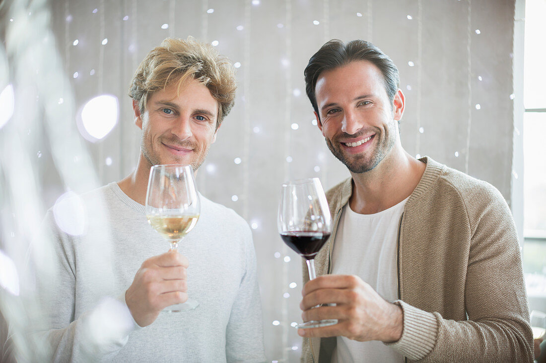 Portrait smiling men wine tasting