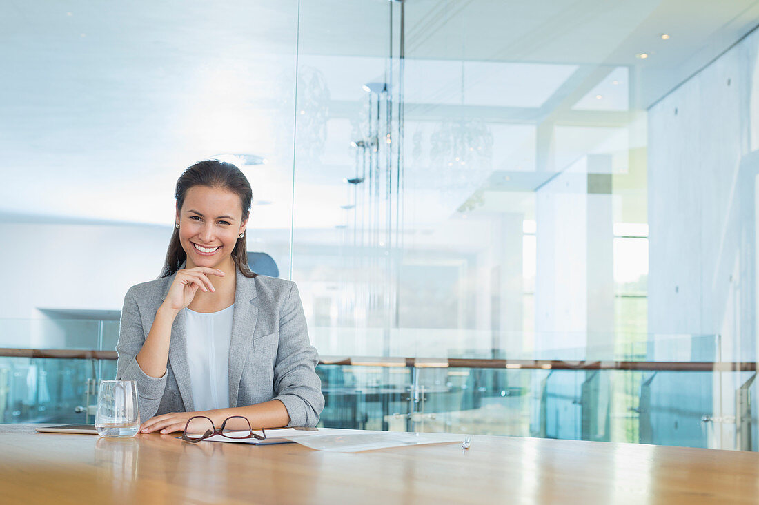 Businesswoman at conference room table