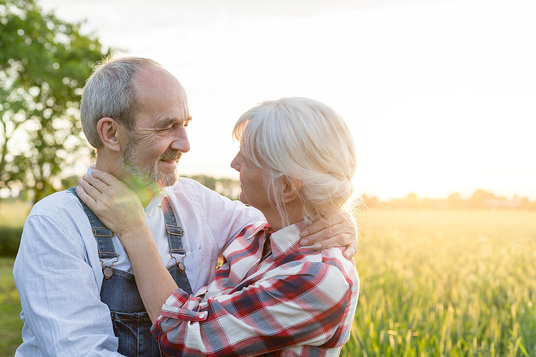 Affectionate senior couple hugging