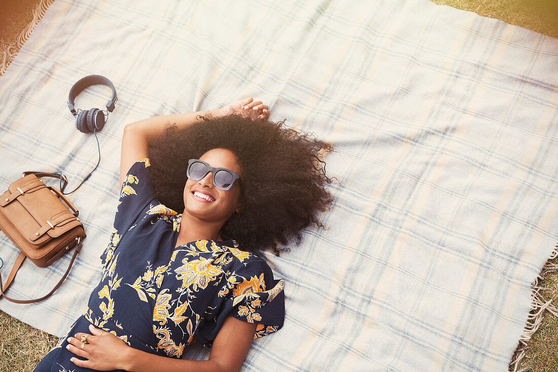 Overhead view Woman with afro layings