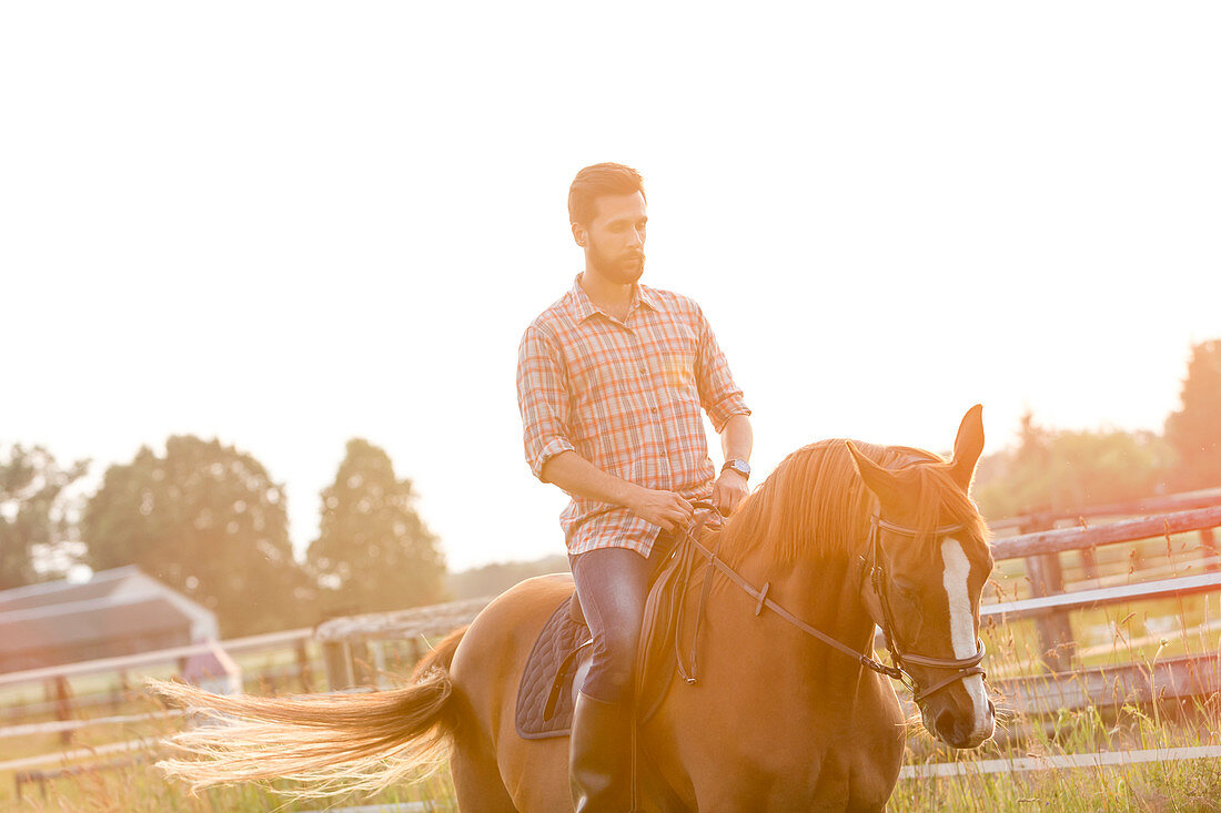 Man horseback riding