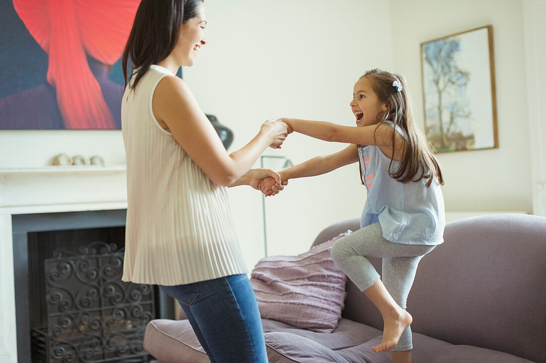 Mother and daughter dancing