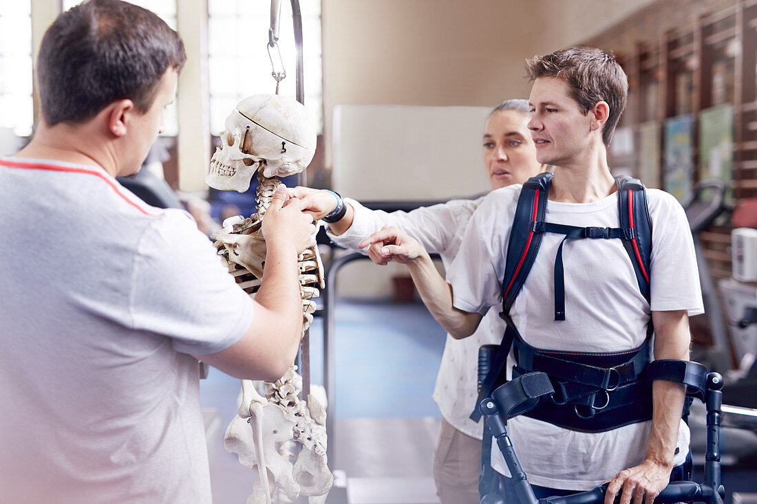 Physiotherapist explaining spine