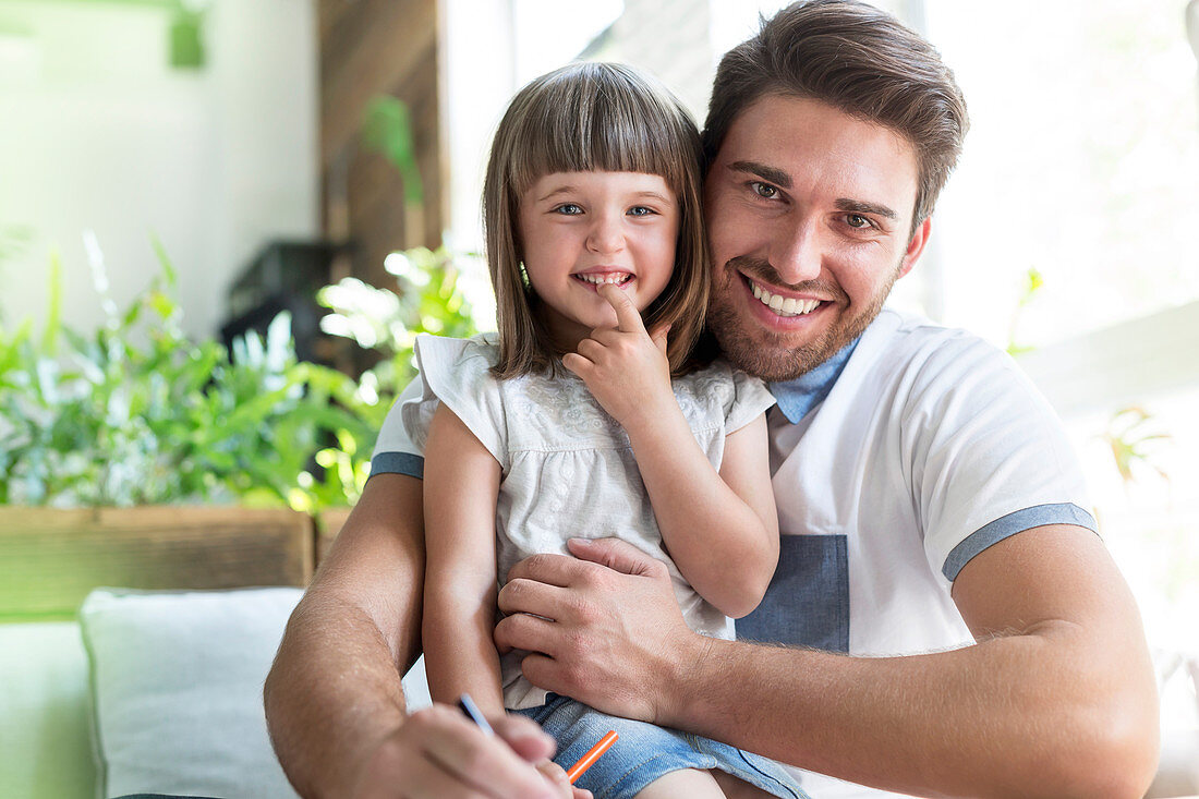 Portrait smiling father and daughter