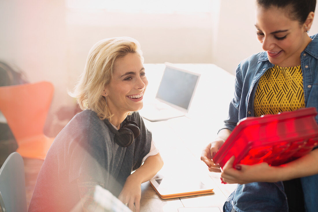 Businesswomen examining prototype