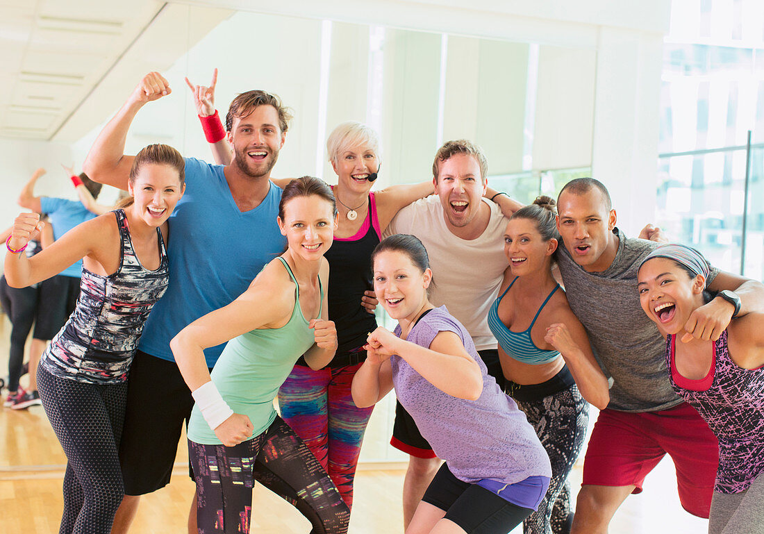 Enthusiastic exercise class cheering