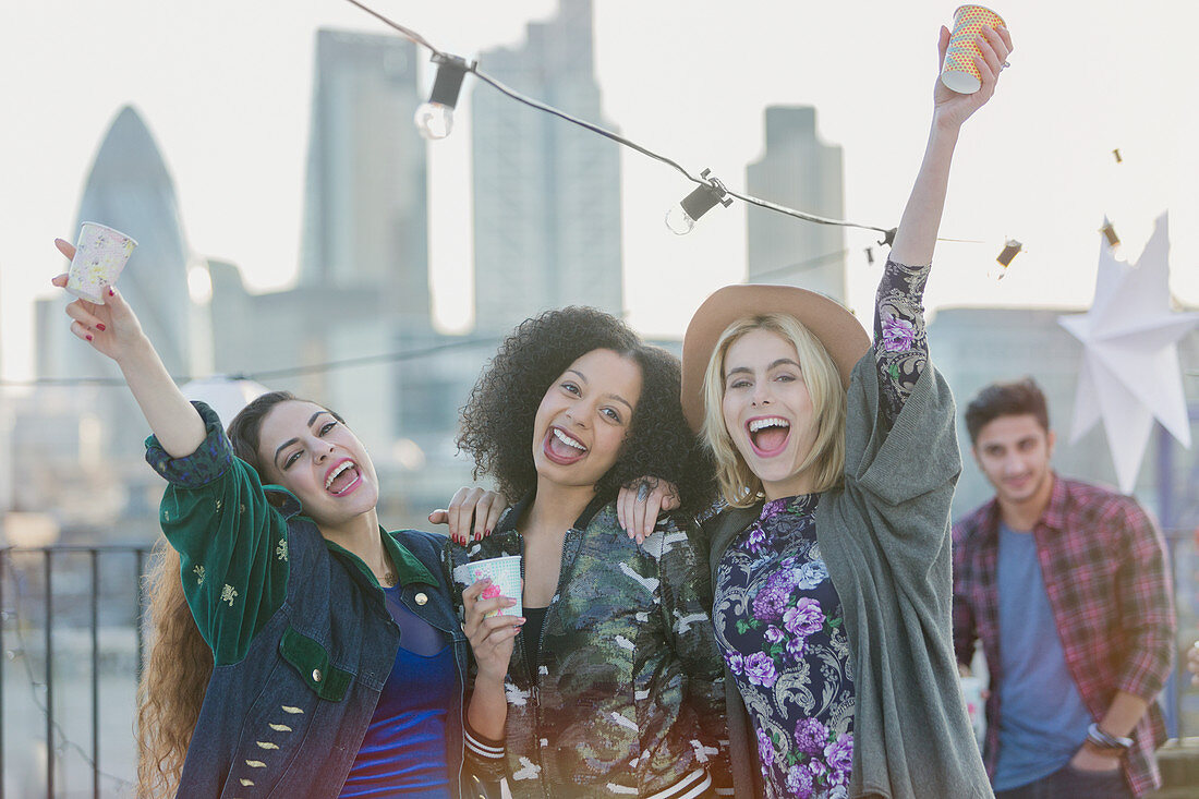 Women cheering and drinking