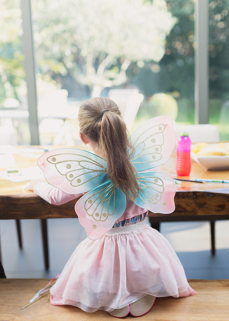 Girl in fairy wings coloring