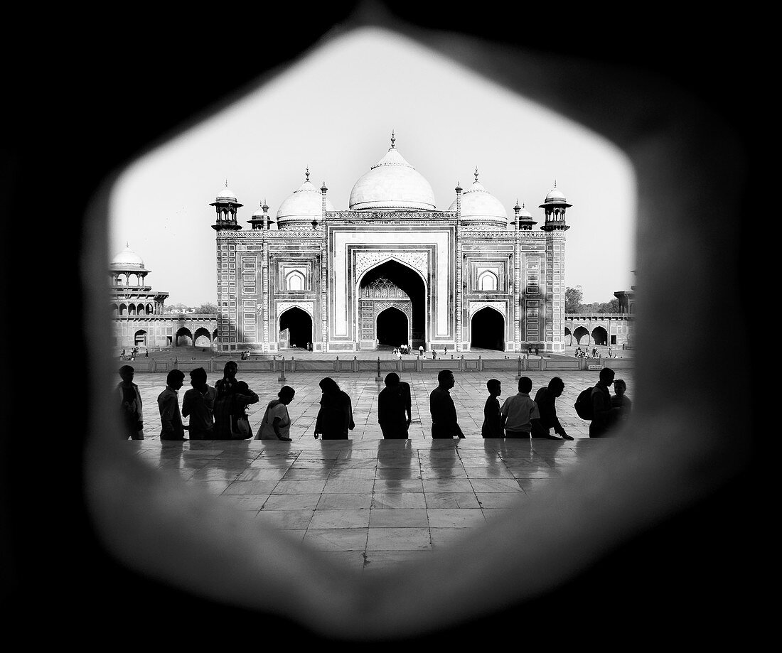 People facing the Taj Mahal, Agra, India