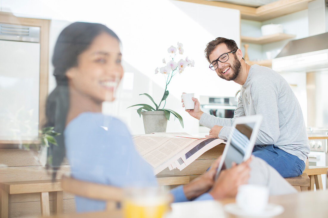 Couple relaxing with tablet